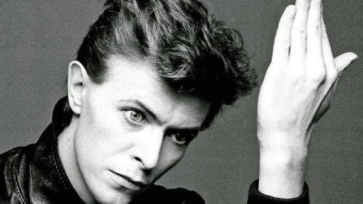 “Heroes”: The Triumph And Despair Behind David Bowie’s Anthemic Song
